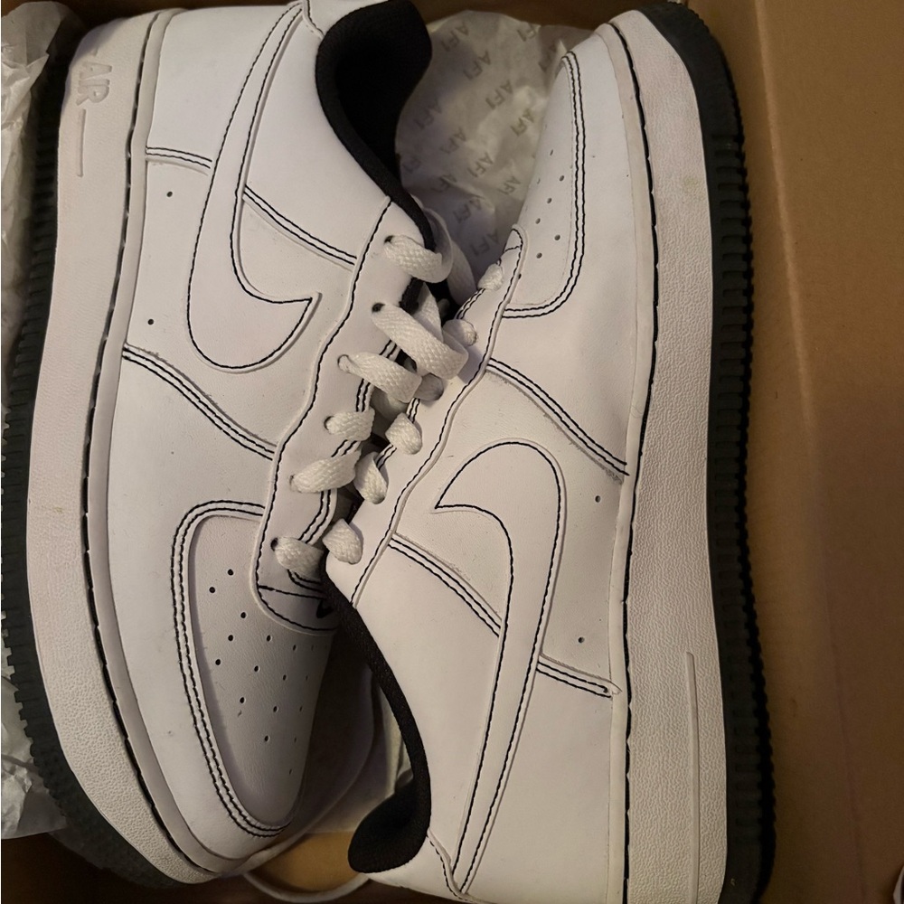 White and Black Nike Air Force 1s